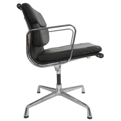 2116 - A PAIR OF VITRA EAMES EA 208 SOFT PAD CHAIRS with black soft leather upholstery and chrome open arms... 