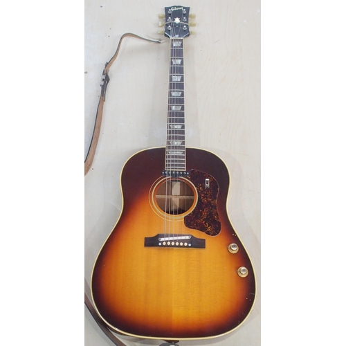 278 - GIBSON a Gibson J160E electro acoustic guitar in dark sunburst serial number 890922 circa 1969 with ... 