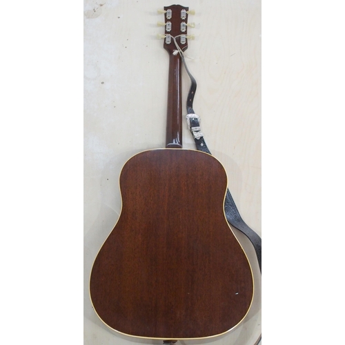 278 - GIBSON a Gibson J160E electro acoustic guitar in dark sunburst serial number 890922 circa 1969 with ... 