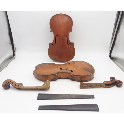 303 - A lot comprising two part violins and a violin case, two piece back 35cm and two piece back 36cm