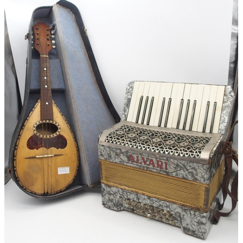 312 - An Alvari 24 bass 25 key piano accordion together with a Sicilian flat back mandolin by Afredo Alber... 