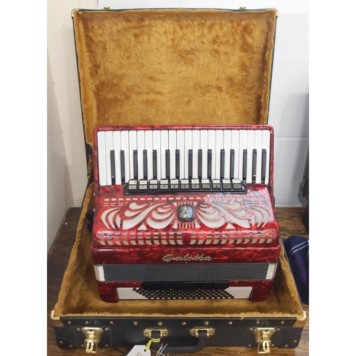 316 - A Galotta IV voice 96 bass 37 key piano accordion in red with a fitted case