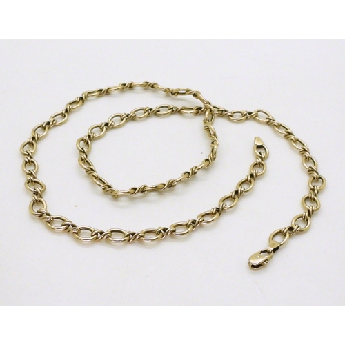 706 - A 9ct gold fancy link chain, length 61cm, weight 17.3gms