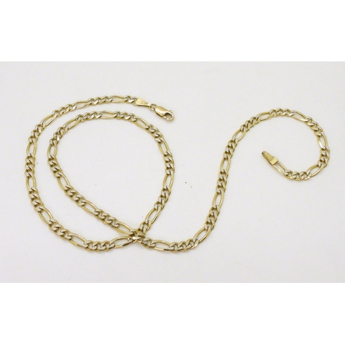 710 - A 9ct bi colour gold figaro chain, length 45cm, weight 10.4gms