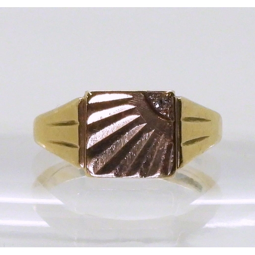 720 - A 9ct gold sunburst pattern signet ring, set with a diamond, hallmarked Birmingham 1963, finger size... 