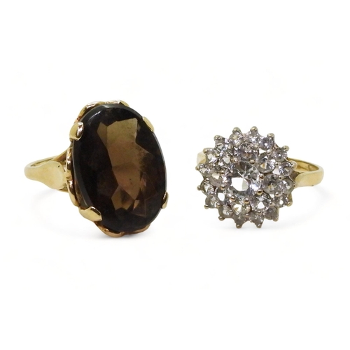 721 - A 9ct gold smoky quartz ring, hallmarked London 1963, size K, and a clear gem set cluster, size O, w... 