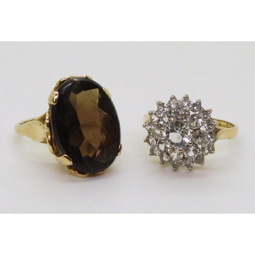 721 - A 9ct gold smoky quartz ring, hallmarked London 1963, size K, and a clear gem set cluster, size O, w... 