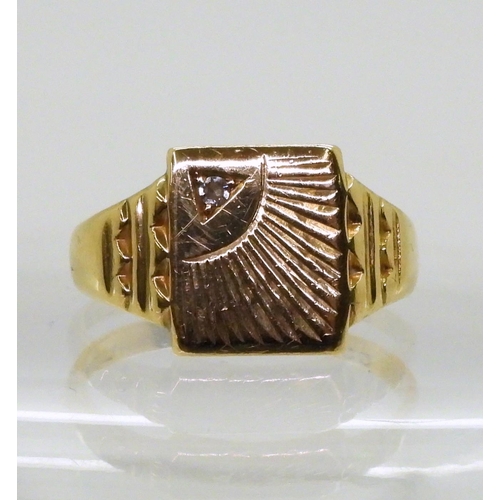 726 - An 18ct gold gents signet ring, with sunrise design, set with a diamond, finger size U, weight 5.7gm... 