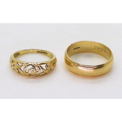 732 - A 9ct gold wedding ring, size T1/2, and a Celtic knotwork ring, size O1/2, weight combined 7.1gms