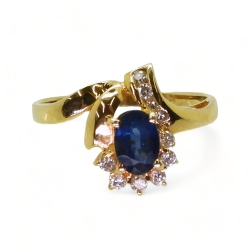 734 - An 18k gold sapphire and diamond ring, size M1/2, weight 2.4gms