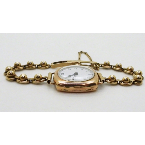 739 - A 9ct gold ladies Swiss made vintage watch and decorative bobble strap, weight including mechanism 1... 