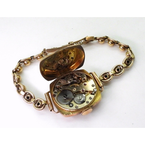739 - A 9ct gold ladies Swiss made vintage watch and decorative bobble strap, weight including mechanism 1... 