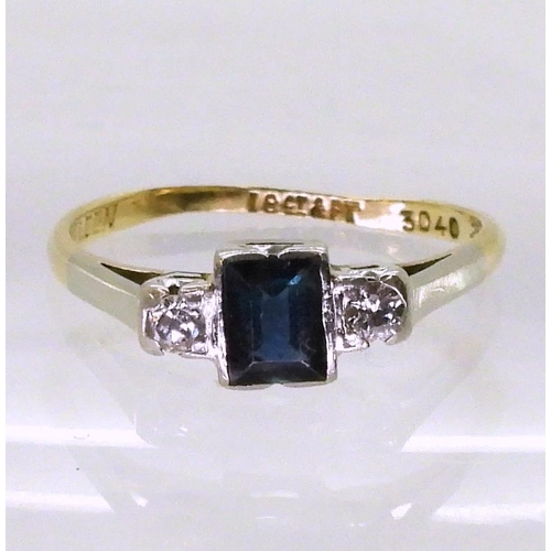 746 - An 18ct and platinum sapphire and diamond ring set with a square cut sapphire of approx 5mm x 4mm x ... 