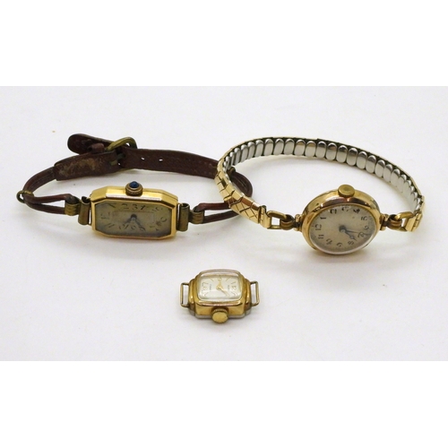 752 - An 18ct gold ladies vintage watch head, weight including strap and mechanism 14.2gms, together with ... 