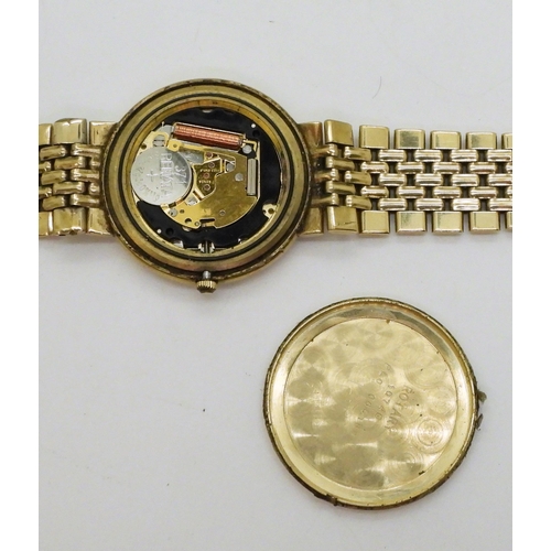 758 - A 9ct gold gents Rotary Elite watch and strap, weight all together 56.6gms