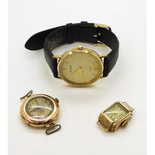 760 - A 9ct gold Accurist watch together with two 9ct gold cased vintage watch heads, weight all together ... 