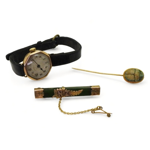 761 - A 9ct gold cased Ingersoll watch, together with a 9ct gold mounted New Zealand jade brooch, together... 