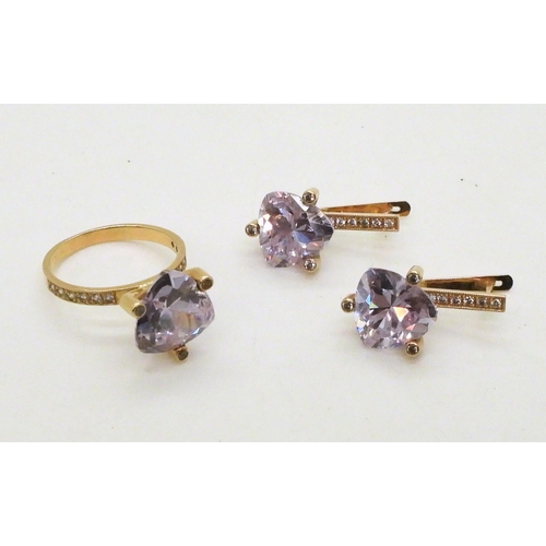 767 - A Russian 14k gold ring and earring suite, set with purple cubic zirconia trilliant cuts, and clear ... 