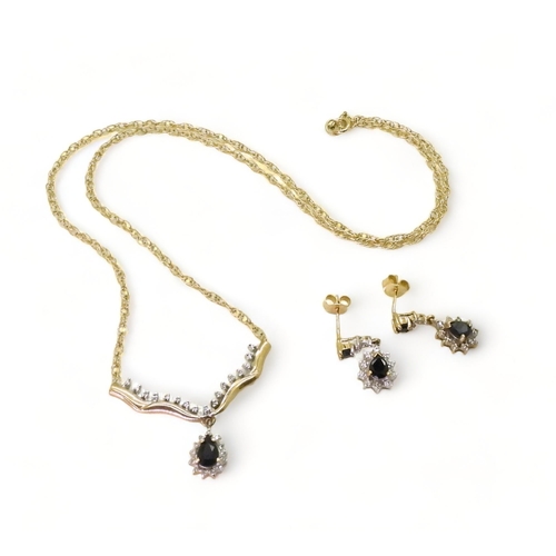 777 - A 9ct gold sapphire and diamond accent pendant necklace, with matching earrings weight together 6gms