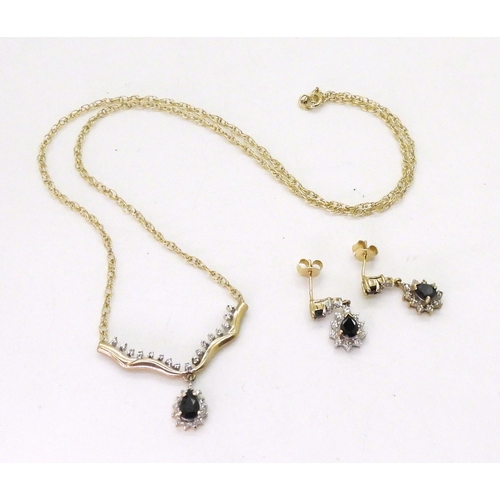 777 - A 9ct gold sapphire and diamond accent pendant necklace, with matching earrings weight together 6gms