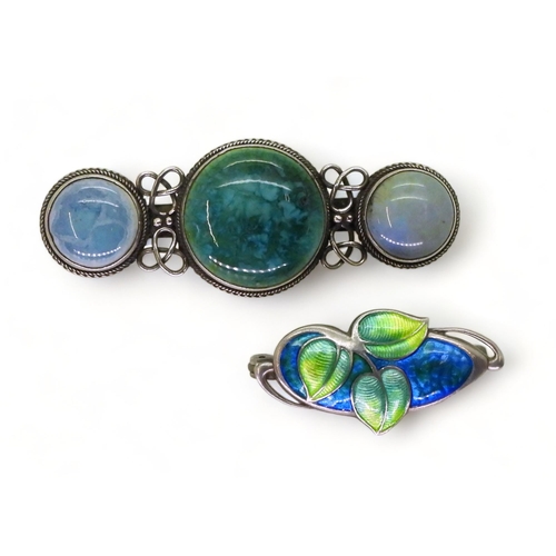 782 - A silver and enamel Charles Horner leaf brooch, together  with an Arts & Crafts Ruskin styl... 