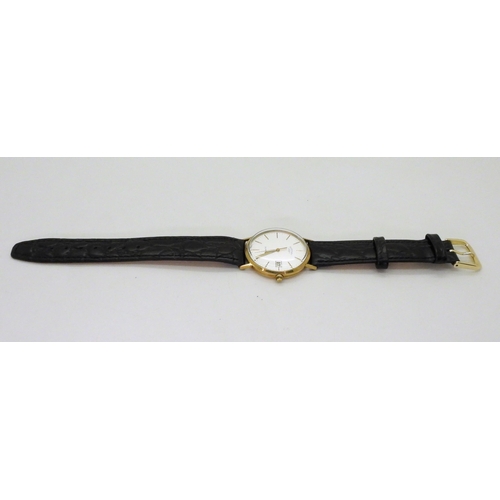 788 - A 9ct gold Rotary quartz watch, weight including mechanism and strap 27.8gms