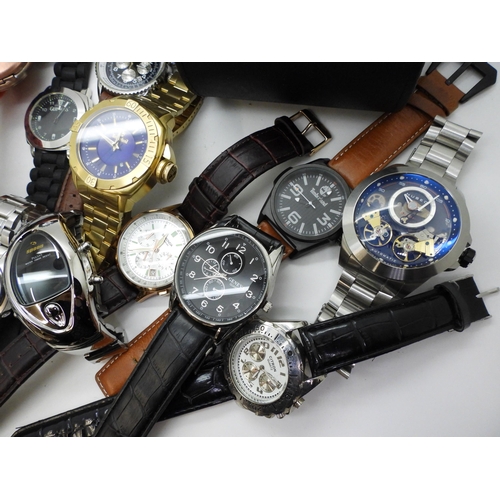 803 - A large collection of fashion watches to include Seiko Chronograph, Nubeo, Sekonda, further Seikos e... 