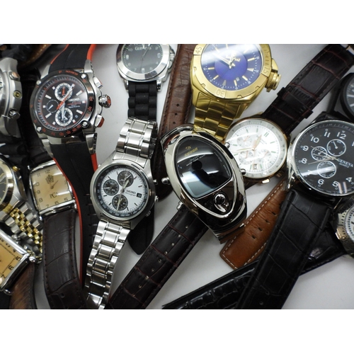 803 - A large collection of fashion watches to include Seiko Chronograph, Nubeo, Sekonda, further Seikos e... 