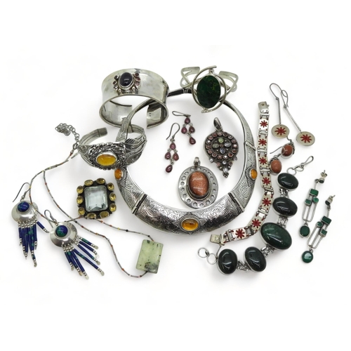 805 - A collection of gem set silver jewellery to include an amber torc style necklace and similar bracele... 