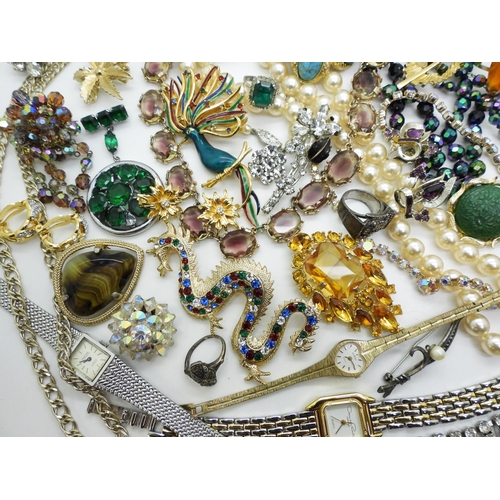 806 - Peacock beads,a watch retailed by Oscar De La Renta, silver and marcasite items, a Montine watch etc