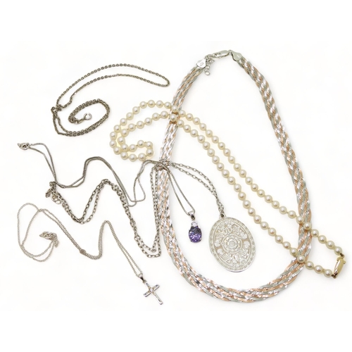 815 - A string of pearls with a 9ct gold clasp, a bi colour silver plaited necklace and other pendants and... 