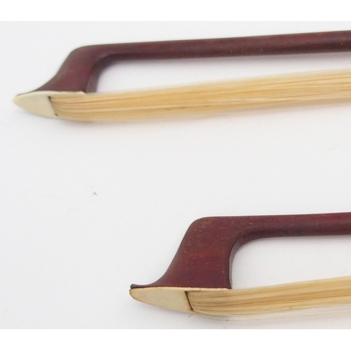 309D - A violin bow 60 grams and another 61 grams