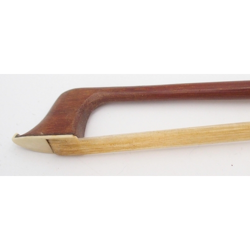 309G - A violin bow 71 grams with inscribed maker's mark SAXONIA