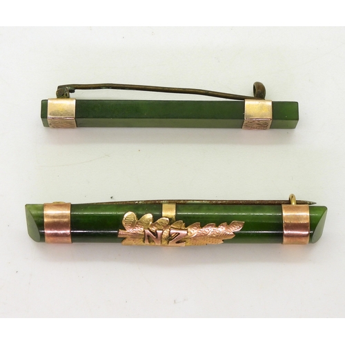 778A - Two New Zealand jade bar brooches mounted with 9ct and yellow metal, length of the longest 5.3cm, we... 