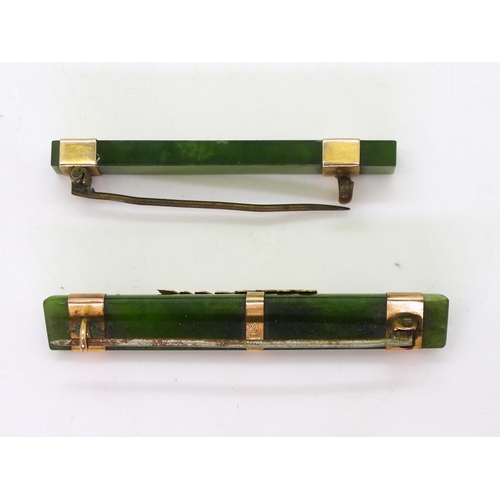 778A - Two New Zealand jade bar brooches mounted with 9ct and yellow metal, length of the longest 5.3cm, we... 