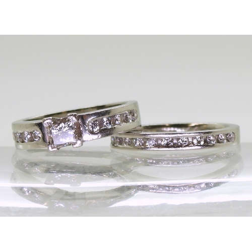 778B - A platinum wedding set made by Blair & Sheridan of Glasgow, comprising of a engagement ring set ... 