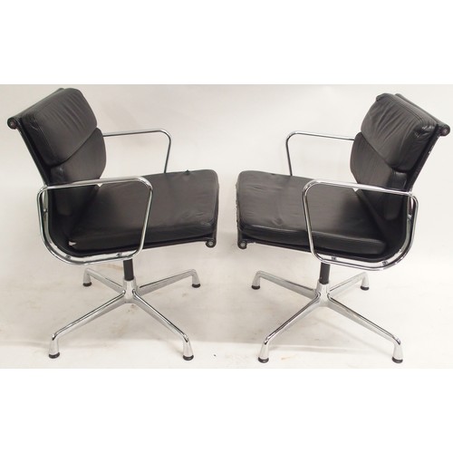 2117 - A PAIR OF VITRA EAMES EA 208 SOFT PAD CHAIRS with black soft leather upholstery and chrome open arms... 