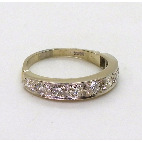 2800 - AN 18CT WHITE GOLD HALF ETERNITY RINGset with estimated approx 0.50cts of brilliant cut diamonds in ... 