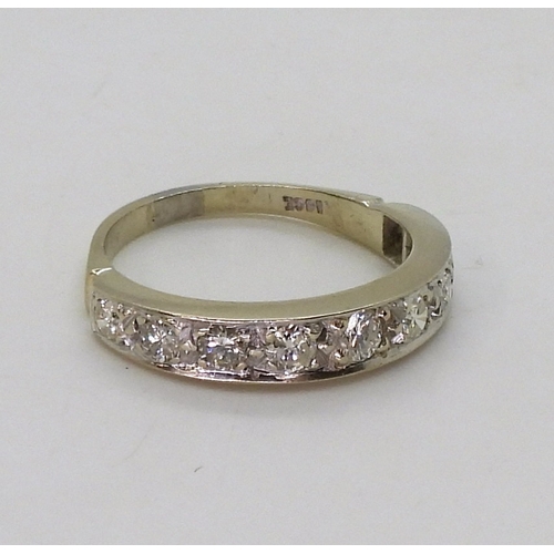 2800 - AN 18CT WHITE GOLD HALF ETERNITY RINGset with estimated approx 0.50cts of brilliant cut diamonds in ... 