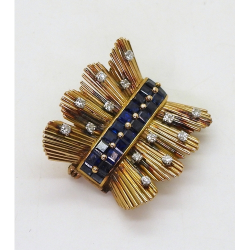 2805 - A RETRO SAPPHIRE & DIAMOND BROOCHcraftsman made in bright yellow metal, set with a double band o... 