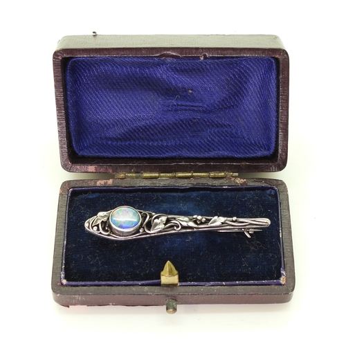 2806 - AN ART & CRAFTS BROOCHpossibly by Rhoda Wager circa 1920's. the white metal bar brooch with leaf... 