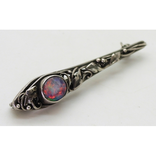 2806 - AN ART & CRAFTS BROOCHpossibly by Rhoda Wager circa 1920's. the white metal bar brooch with leaf... 