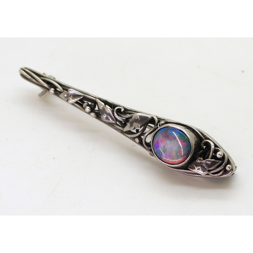 2806 - AN ART & CRAFTS BROOCHpossibly by Rhoda Wager circa 1920's. the white metal bar brooch with leaf... 