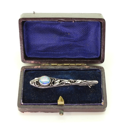 2806 - AN ART & CRAFTS BROOCHpossibly by Rhoda Wager circa 1920's. the white metal bar brooch with leaf... 