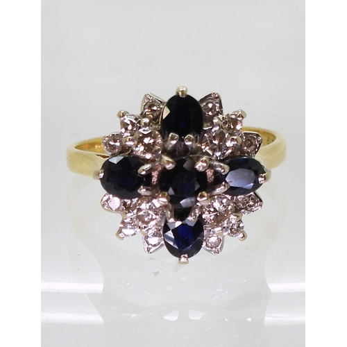 2812 - A SAPPHIRE & DIAMOND CLUSTER RINGwith a classic 18ct gold basket setting. set with four oval sap... 