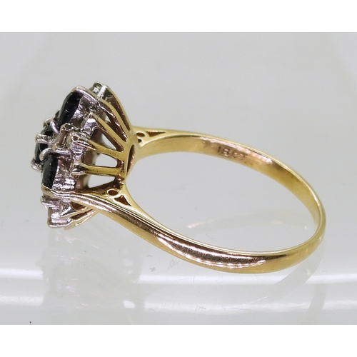 2812 - A SAPPHIRE & DIAMOND CLUSTER RINGwith a classic 18ct gold basket setting. set with four oval sap... 