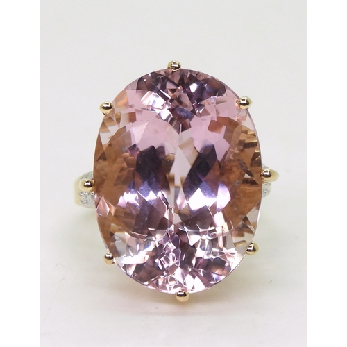 2817 - A KUNZITE STATEMENT RINGmeasuring 20mm x 15mm x 11mm, in 14k gold multi claw basket setting, with di... 