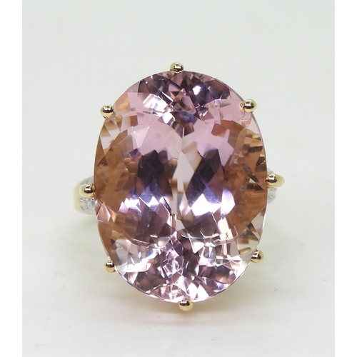 2817 - A KUNZITE STATEMENT RINGmeasuring 20mm x 15mm x 11mm, in 14k gold multi claw basket setting, with di... 