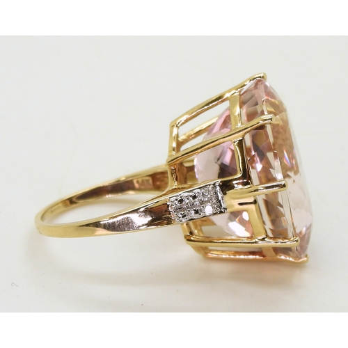 2817 - A KUNZITE STATEMENT RINGmeasuring 20mm x 15mm x 11mm, in 14k gold multi claw basket setting, with di... 