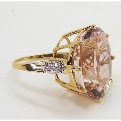 2817 - A KUNZITE STATEMENT RINGmeasuring 20mm x 15mm x 11mm, in 14k gold multi claw basket setting, with di... 